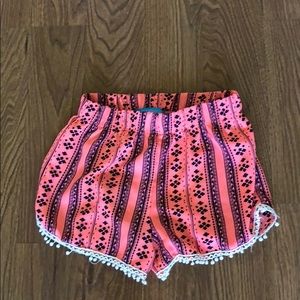 Pink shorts with black stripes